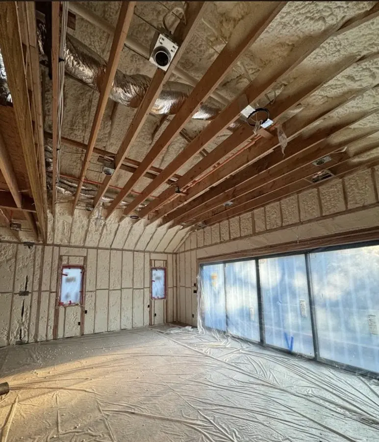Interior walls and ceiling insulated with spray foam during new construction in St. Paul